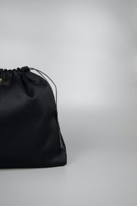 Selena in Gold on Black Twill Drawstring Pouch Handbag