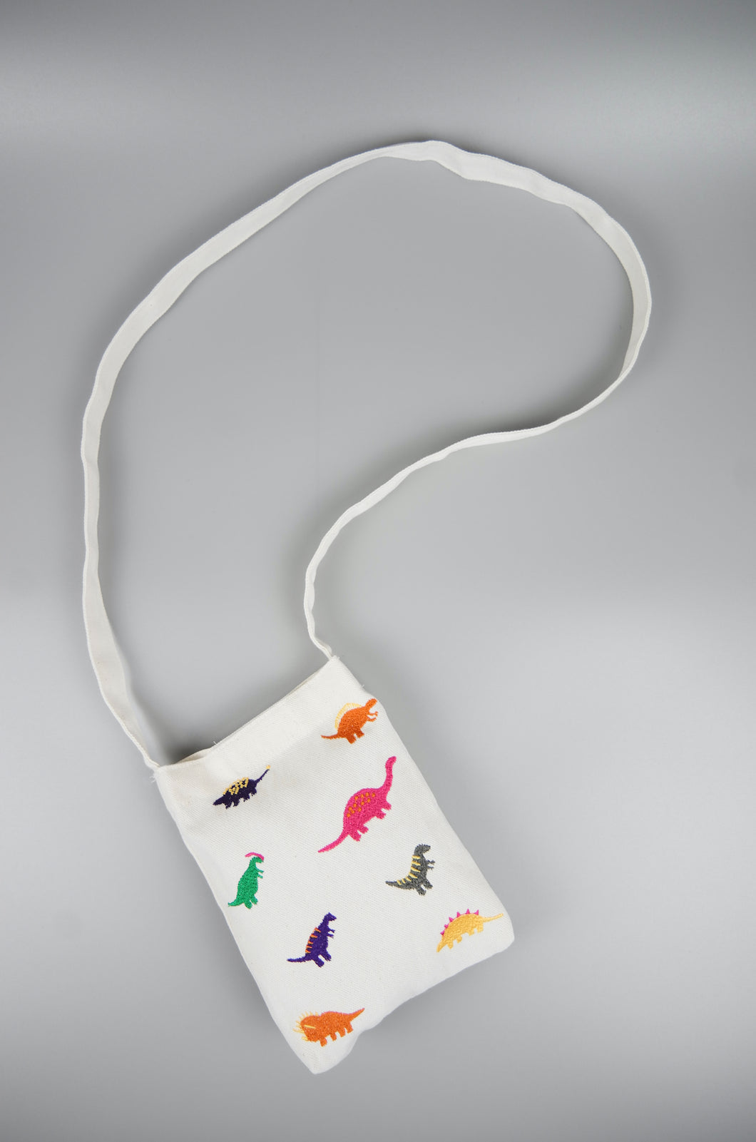 Dinosaurs on Natural Canvas Mini Sling Bag