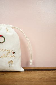 Christmas Elements on Light Canvas Mini Drawstring Pouch