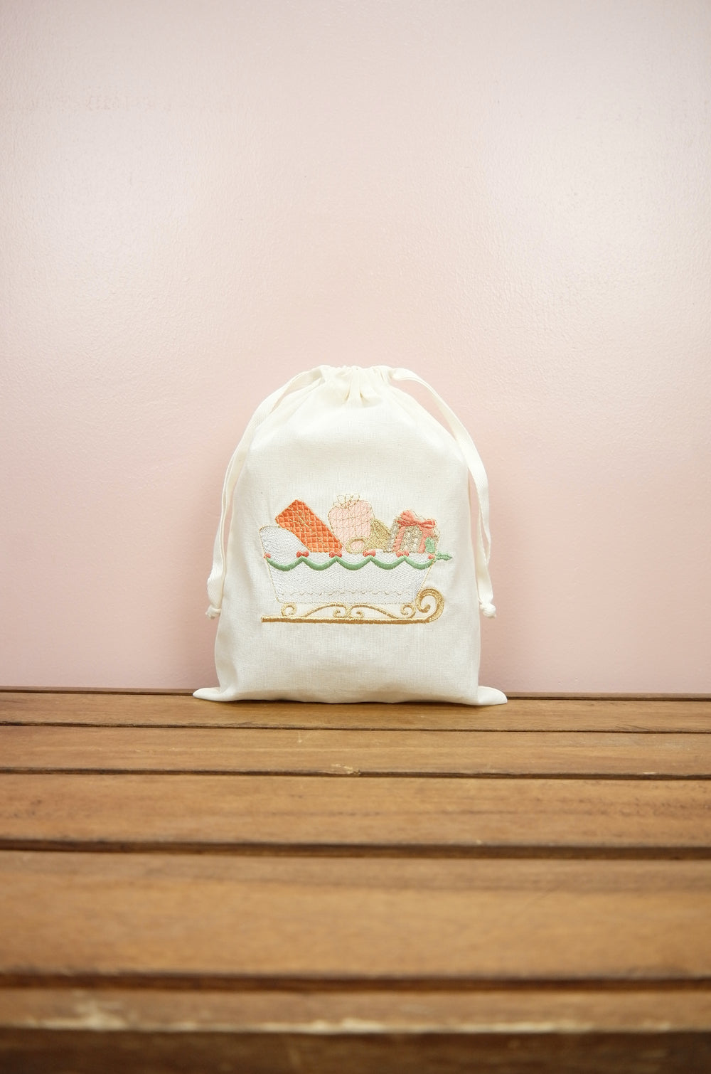 Sleigh with Gifts on Light Canvas Medium Drawstring Pouch