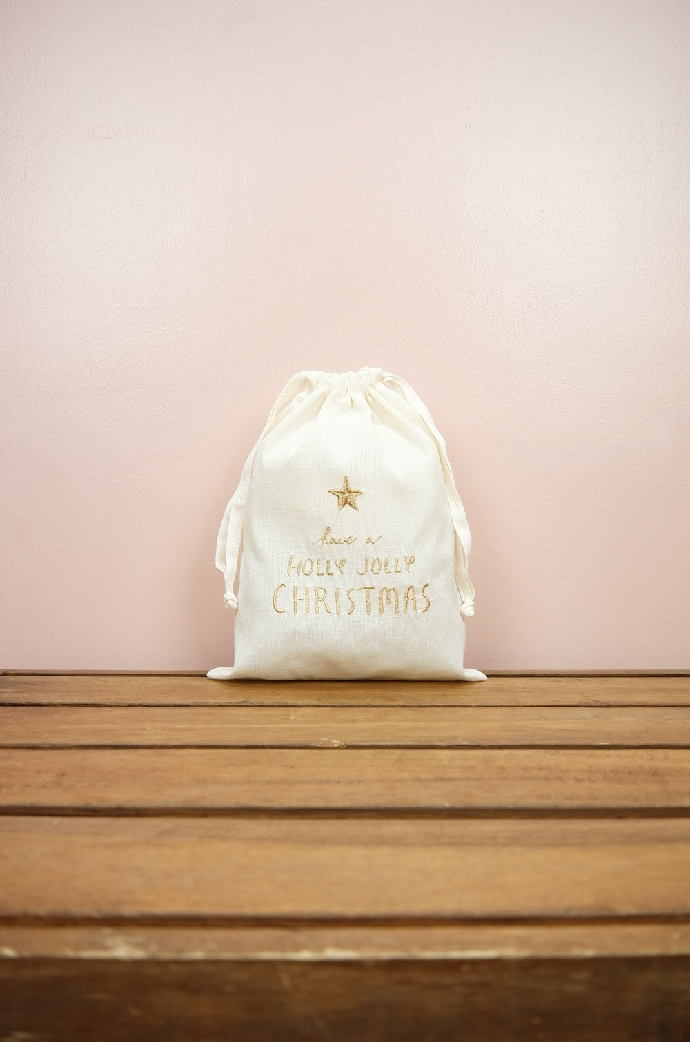 Holly Jolly Christmas on Light Canvas Medium Drawstring Pouch