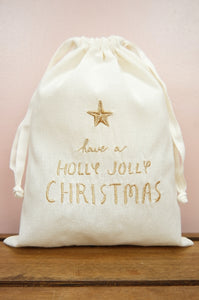 Holly Jolly Christmas on Light Canvas Medium Drawstring Pouch