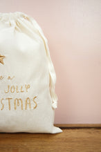 Holly Jolly Christmas on Light Canvas Medium Drawstring Pouch