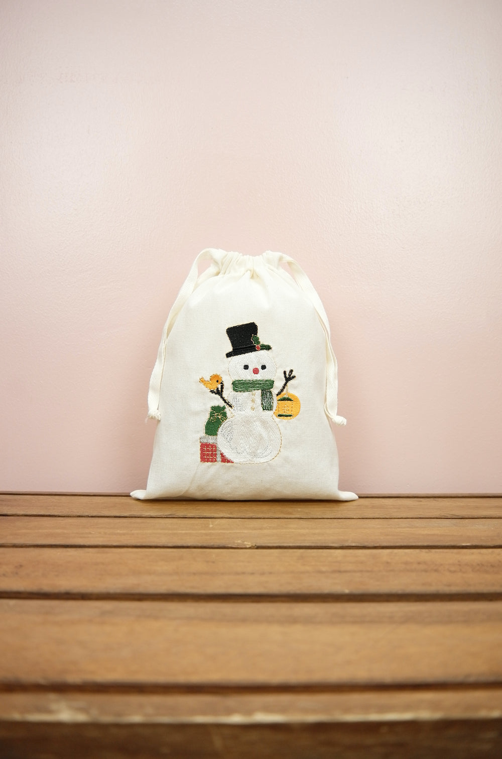 Snowman with Lantern on Light Canvas Medium Drawstring Pouch