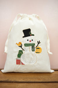 Snowman with Lantern on Light Canvas Medium Drawstring Pouch