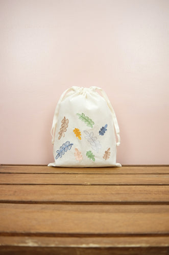 Colorful Leaves on Light Canvas Medium Drawstring Pouch