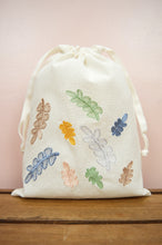 Colorful Leaves on Light Canvas Medium Drawstring Pouch