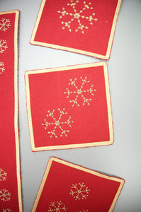 Gold Snowflakes on Red Canvas Coaster