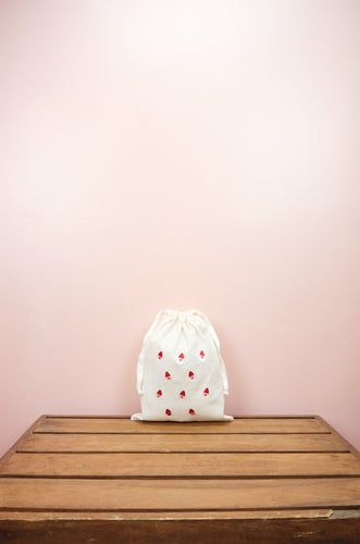 Mini Santas on Light Canvas Medium Drawstring Pouch