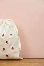 Mini Santas on Light Canvas Medium Drawstring Pouch