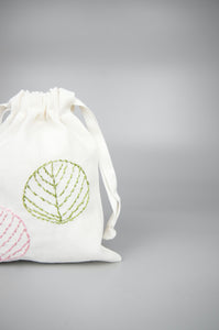 Round Leaves on Light Canvas Mini Drawstring Pouch